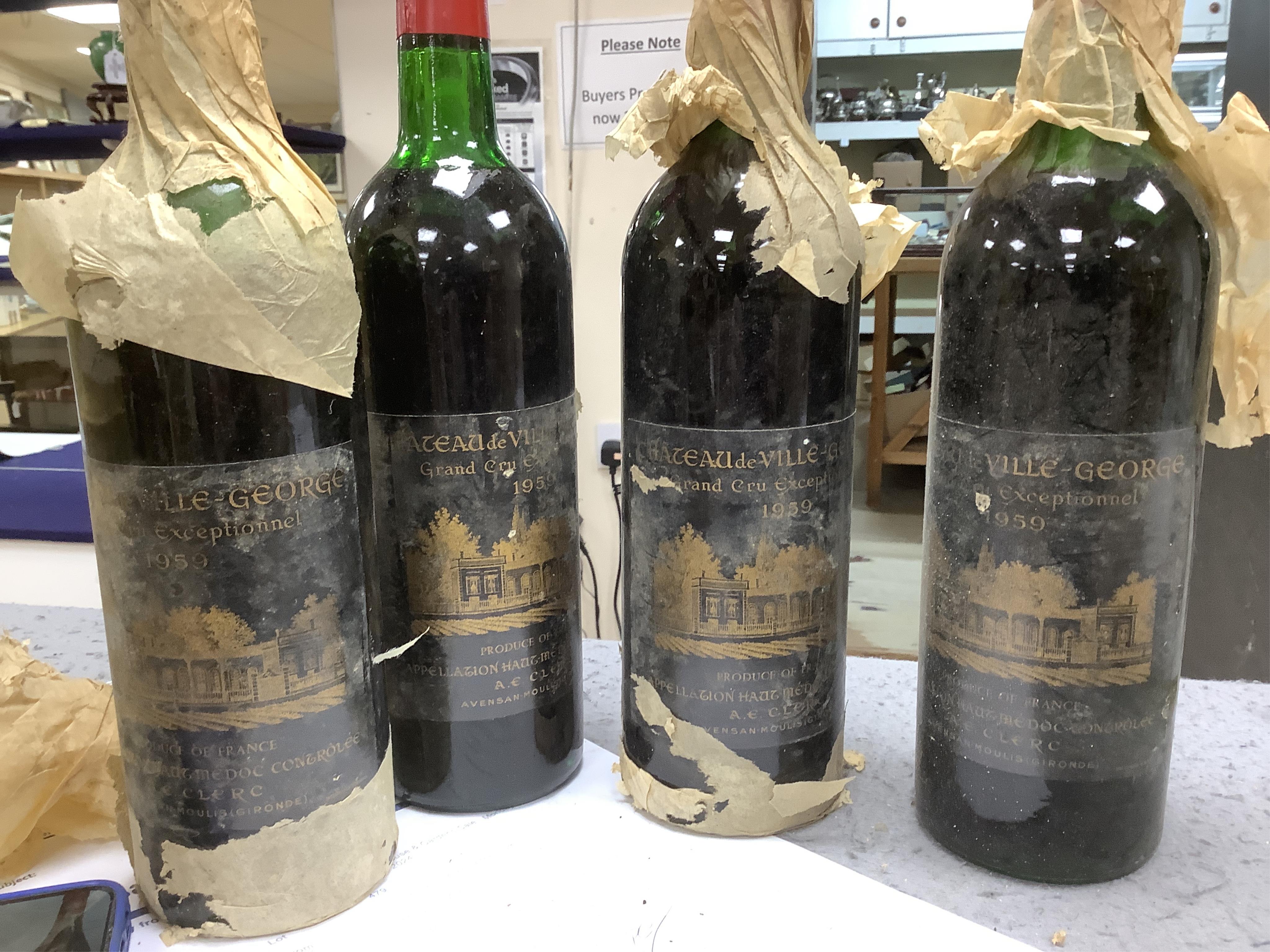 Ten bottles of red wines to include six bottles of mixed Claret/Bordeaux, four bottles Chateau de Ville-George’s, Grand Cru 1959, two bottles of Chateau Leoville Barton 1947 and two others without labels, a bottle Cau de